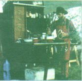 camp cook at work at chuck wagon